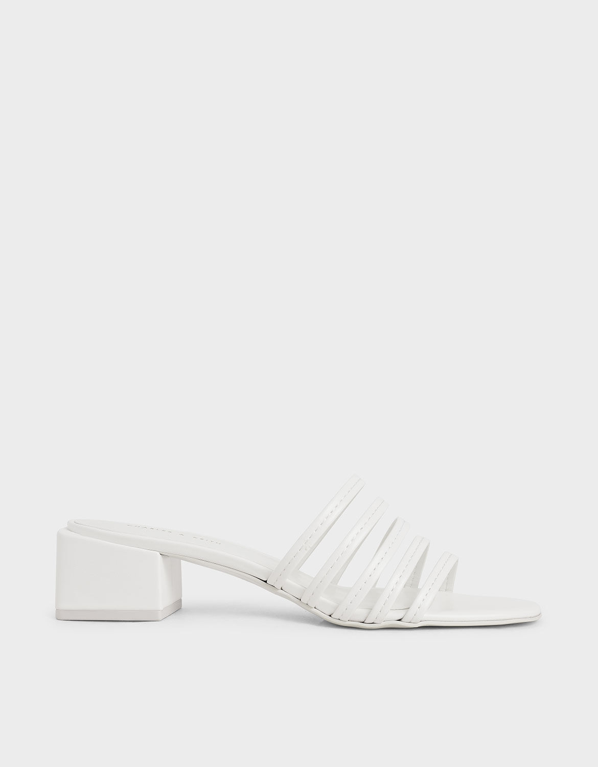 white heeled mules uk