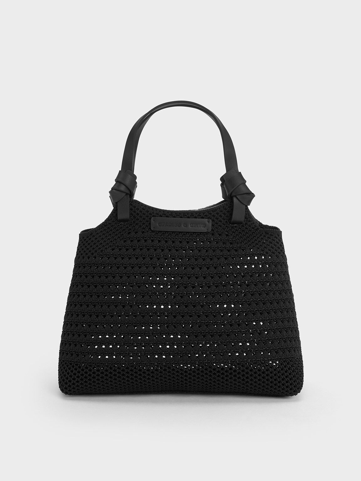 The Knotted Crossbody Bag in Woven Leather