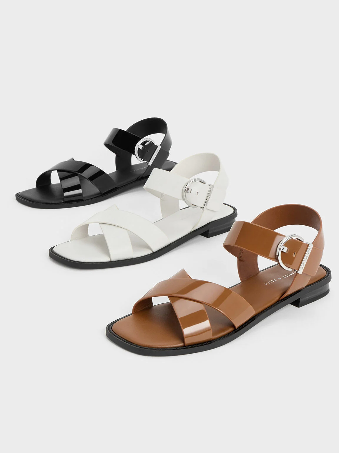 Women’s patent crossover strap sandals - CHARLES & KEITH