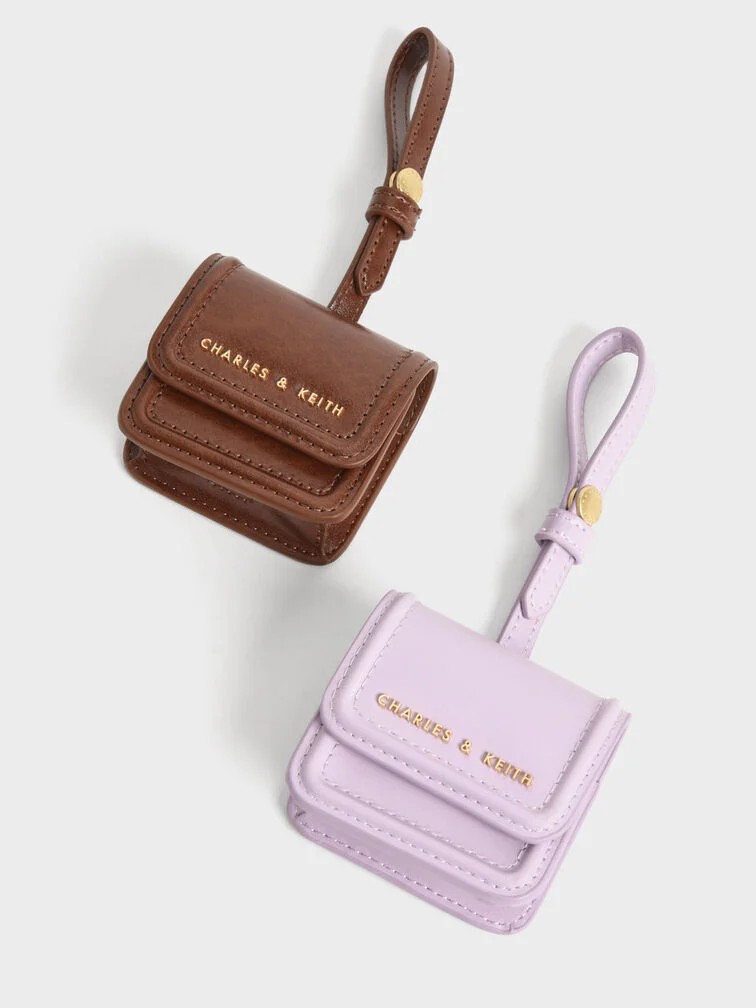 Women’s stitch-trim Airpods pouch in dark brown and lilac - CHARLES & KEITH