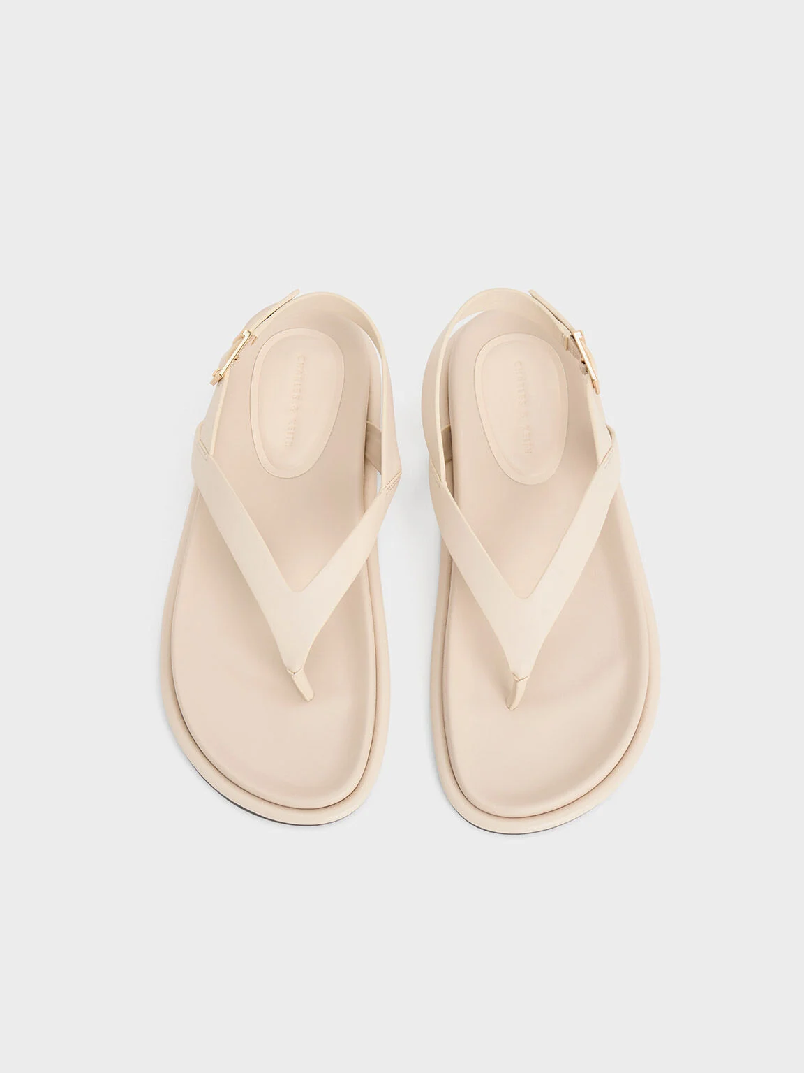 Women’s v-strap thong sandals in cream - CHARLES & KEITH