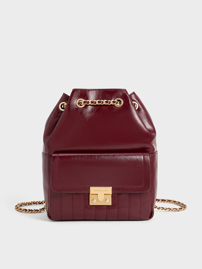 Women’s Donna crinkle-effect backpack in burgundy — CHARLES & KEITH