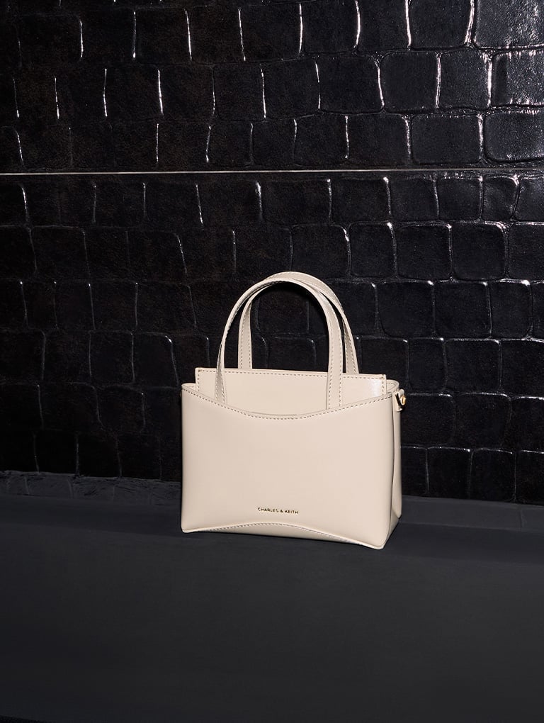 Mini Sybill Tote Bag in oat – CHARLES & KEITH