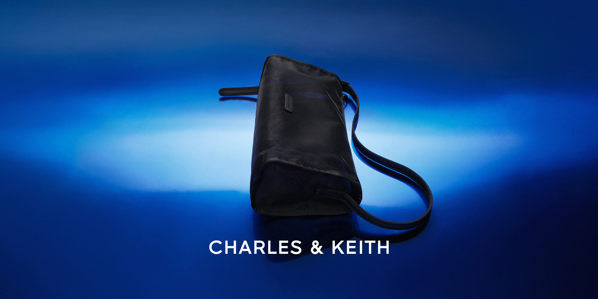 Mesh Elongated Shoulder Bag in black - CHARLES & KEITH