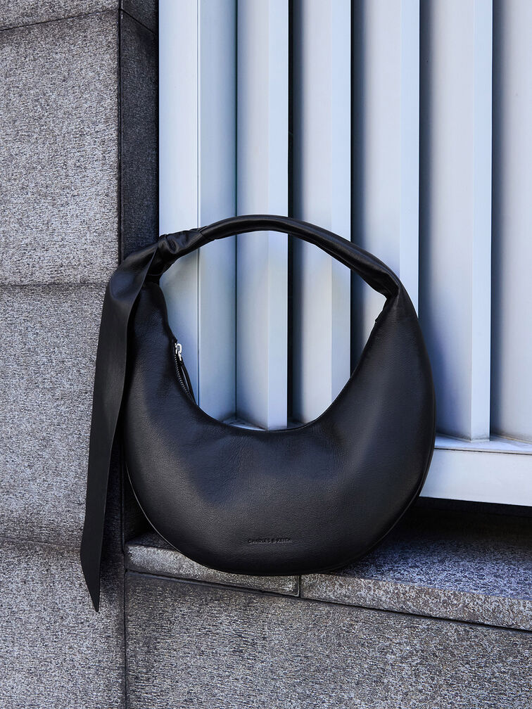 Women’s mini Toni knotted crescent hobo bag in noir - CHARLES & KEITH