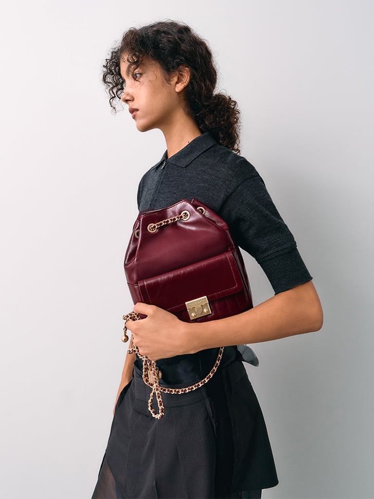 Women’s Donna crinkle-effect backpack in burgundy — CHARLES & KEITH