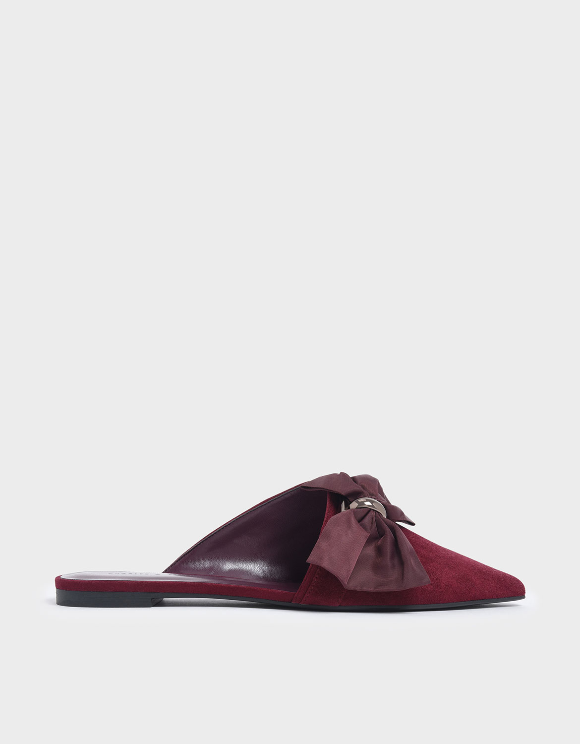 

Oversized Bow Asymmetric-Cut Textured Mules, Purple