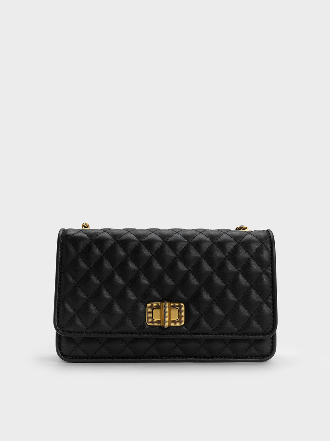 Quilted clutch 2024 charles and keith