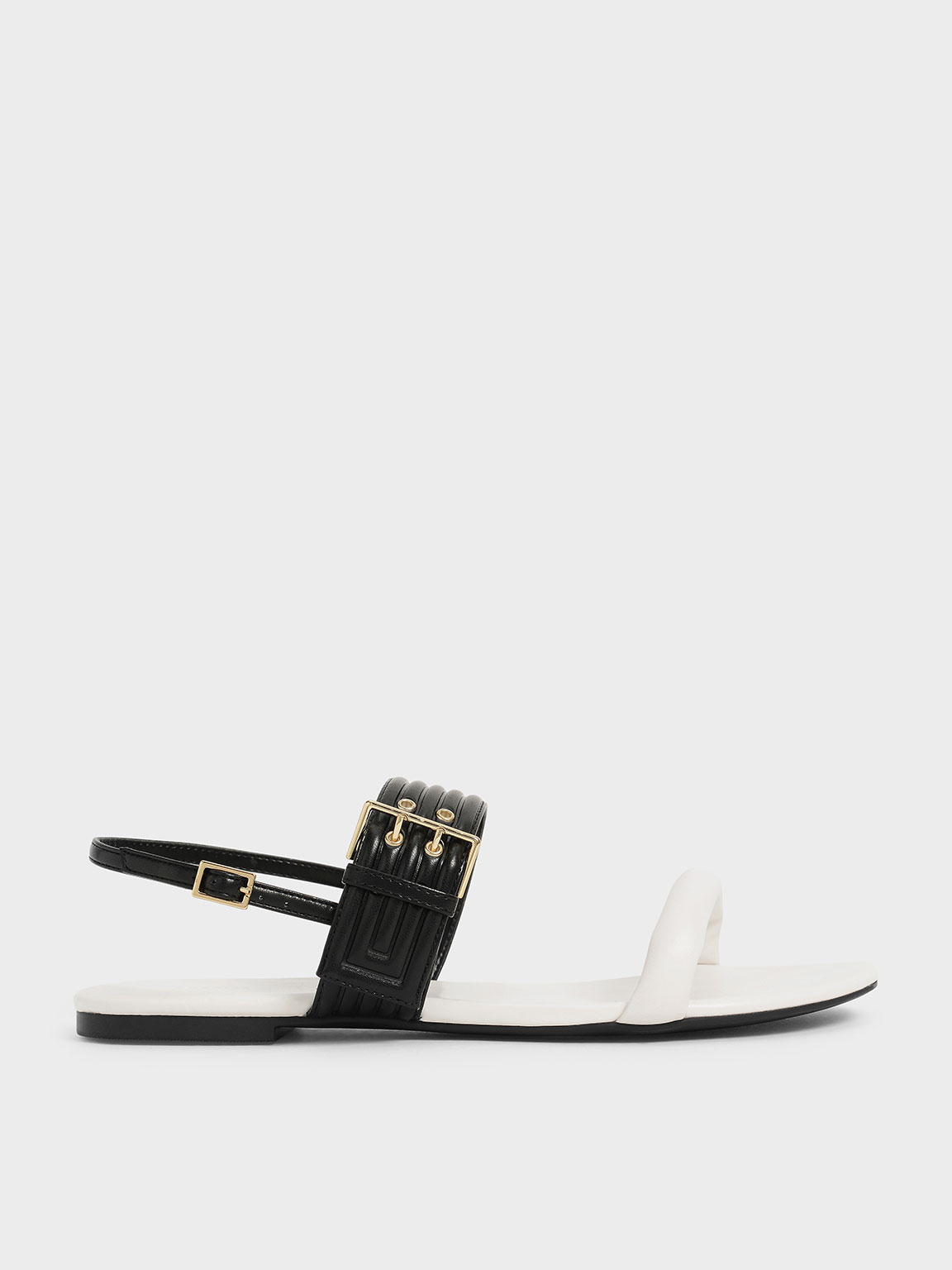 

Two-Tone Puffy Grommet Sandals